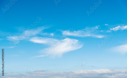 Blue sky with white clouds background © xy
