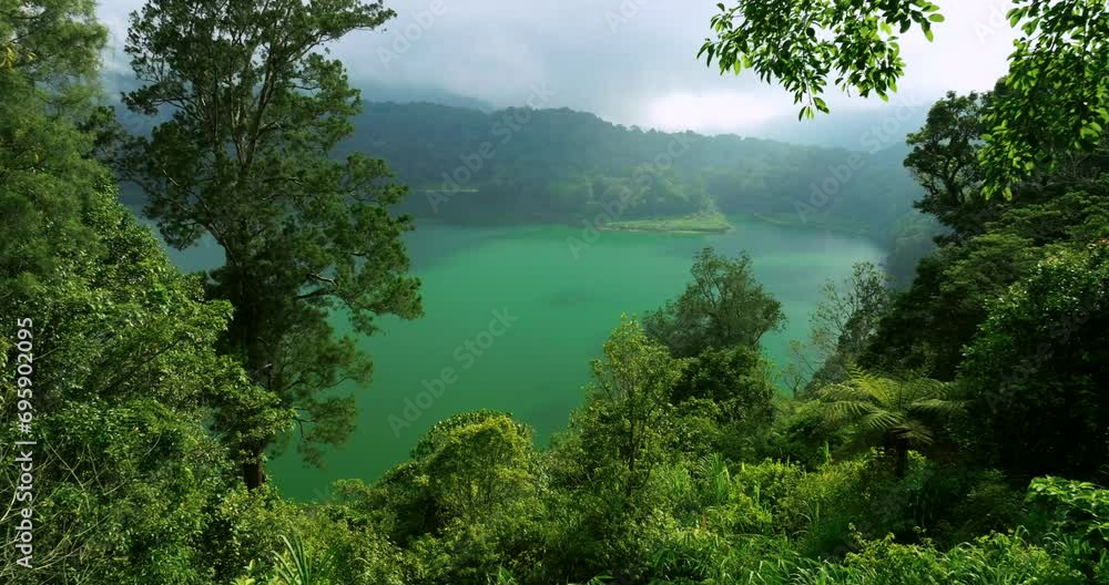 Lake Danau Buyan in Mountains of Bali, Indonesia. Hills of north Bali Lake Danau Buyan in Mountains of Bali, Indonesia. Hills of north Bali