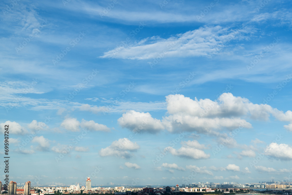 The city under cloud blue sky