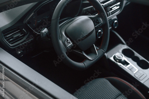 View of the steering wheel and interior in modern car © standret