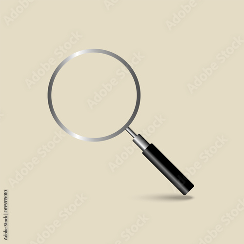 Magnifying glass isolated on light yellow background.