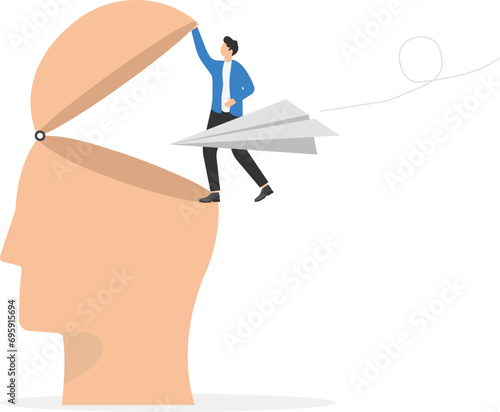 Open mind to receive new messages or inspiration, free your brain to think about new idea or free your ego concept, businessman open human head to let origami paper airplane flying inside.

