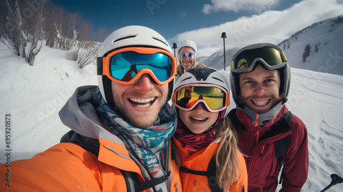 Group of multinational friends in colorful winter clothes are having fun and doing selfie at the top of mountain. Winter ski and snowboarding vacations concept