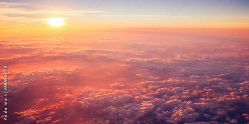 Photograph from the airplane cabin, clouds, beautiful sky Airplane flight at sunset or dawn air travel