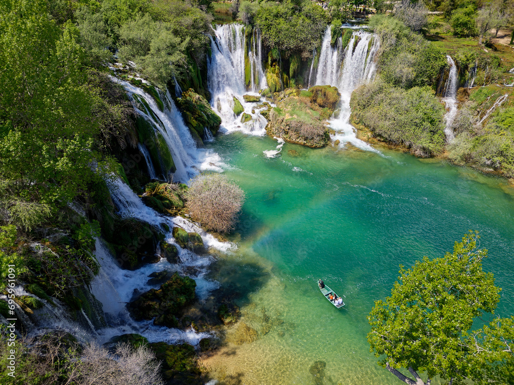 Aerial view of Kravica Waterfall in Bosnia and Herzegovina. The Kravica waterfall is a pearl of the Herzegovinian landscape. It is a unique natural beauty in the Trebizat River. Oasis in stone.