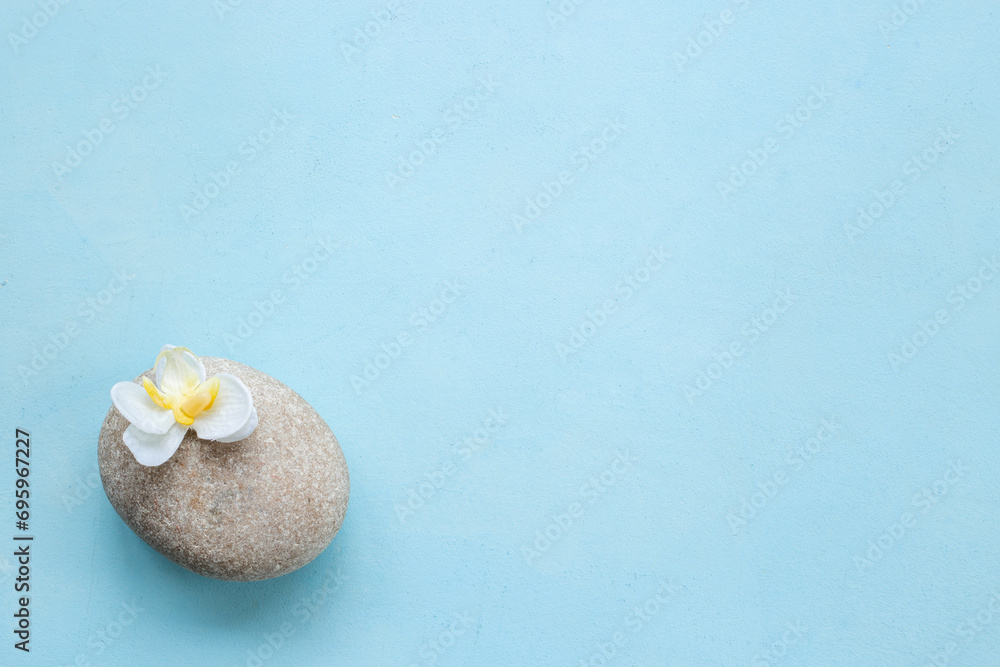 Zen stones with lotus flower - purity harmony and balance concept Zen stones with lotus flower - purity harmony and balance concept