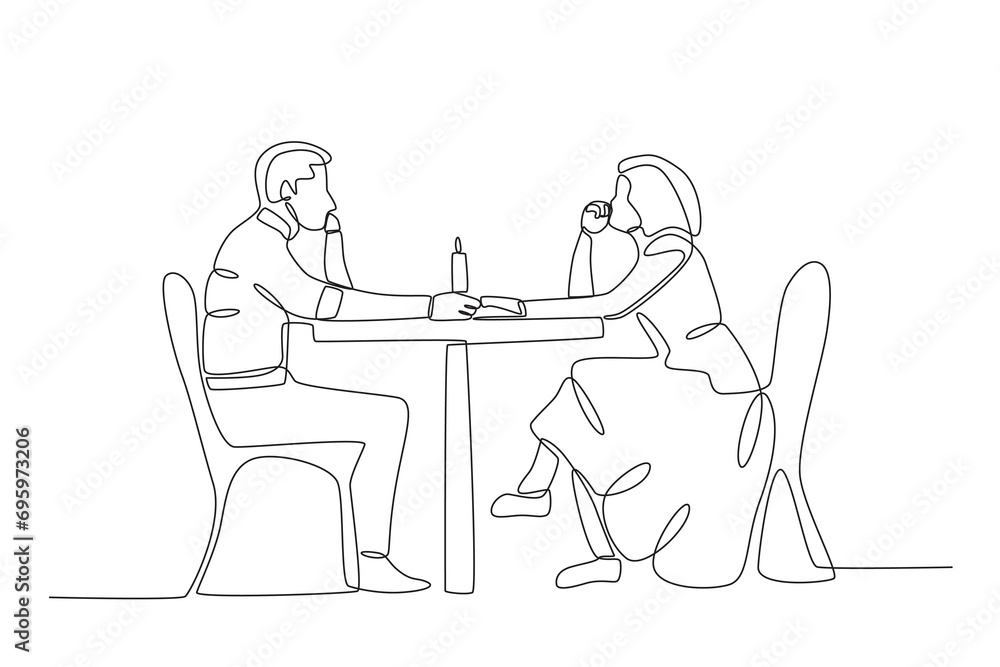 A couple holding romantic hands. Candle light dinner one-line drawing