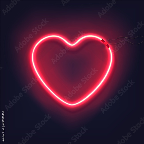 Neon heart on dark background. Decoration, sign or symbol for Valentine's Day. Electric light glow banner.