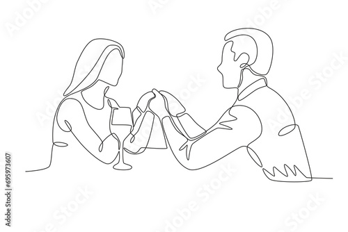 Lovers holding each other's hands. Candle light dinner one-line drawing