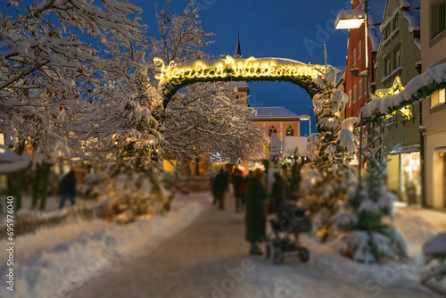 Bavarian Christmas Market at night with illuminated warm lights photo