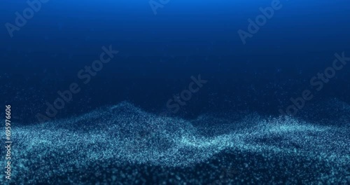 Abstract blue ocean with foamy surface and flying spray. Seamless looping animation. photo