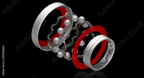 Exploded view of spherical rolling element bearing (ball bearing) on a black background photo