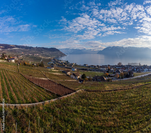 Landscape with mountains, vineyard and lake. Lavaux vineyard, buildings and Lake Geneva.