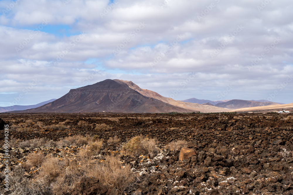 Warm Desert Serenity: Majestic Volcanic Landscape with a Dreamy Touch