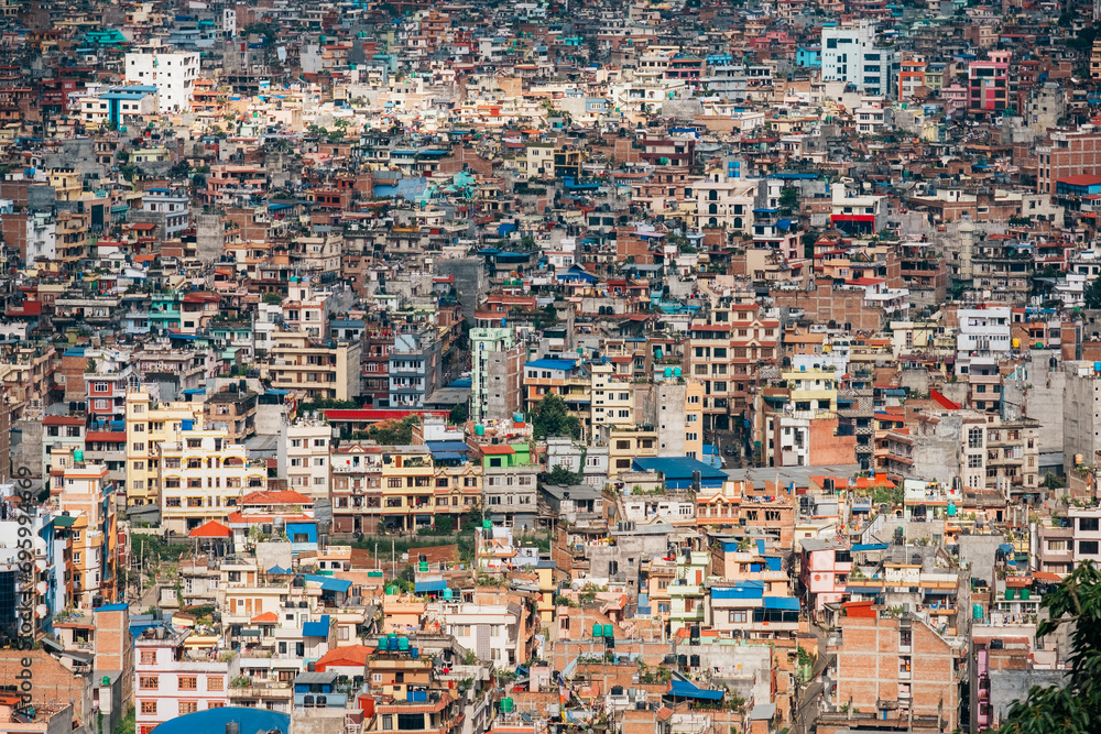 Kathmandu - the capital of Nepal bird eye view to the city center overloaded with poor quarters. Pollution, disorderly urban growth and traveling in Asia concept photo.