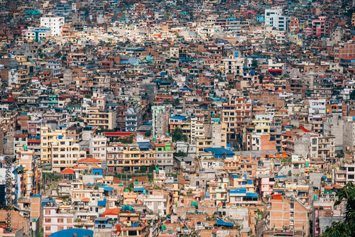 Kathmandu - the capital of Nepal bird eye view to the city center overloaded with poor quarters. Pollution, disorderly urban growth and traveling in Asia concept photo.