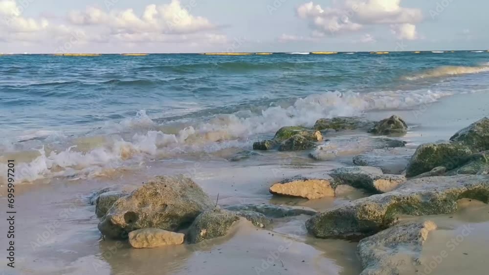Stones rocks corals turquoise green blue water on beach Mexico. Stones rocks corals turquoise green blue water on beach Mexico.