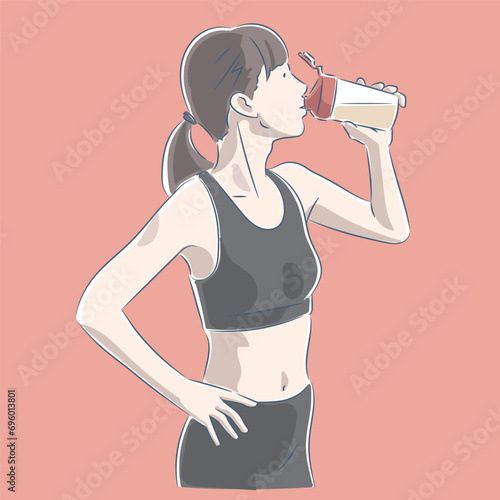 トレーニング中、水分補給する女性