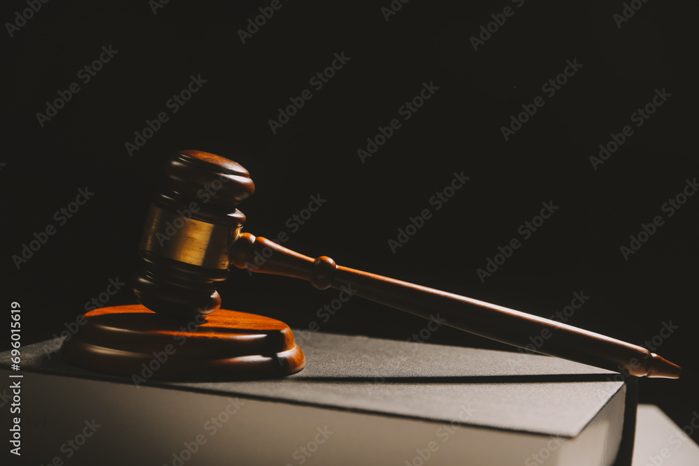 image of judge's hammer, scales lady of justice, law book, laptop computer and contract documents with pen concept of law and justice. image of judge's hammer, scales lady of justice, law book, laptop computer and contract documents with pen concept of law and justice.