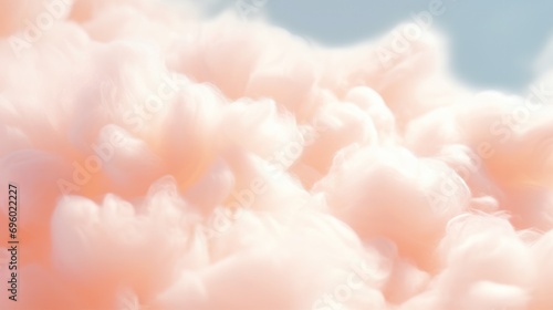 Cotton candy orange background with fluffy clouds in the sky.