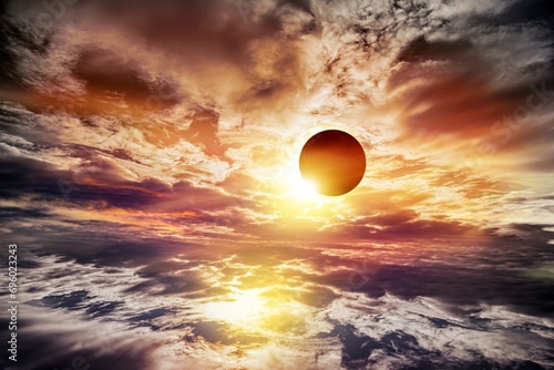 Fototapeta Naklejka Na Ścianę i Meble -  total solar eclipse in clouds, atmosphere . eclipse of the sun, beautiful phenomenon of nature