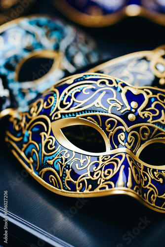 Close-up of Venetian masks. Vertical photo. Bright Masks and Radiant Smiles. Carnival in All Its Splendour
