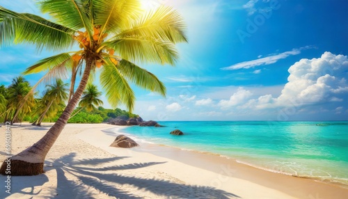paradise sunny beach with coco palms and turquoise sea summer vacation and tropical beach concept