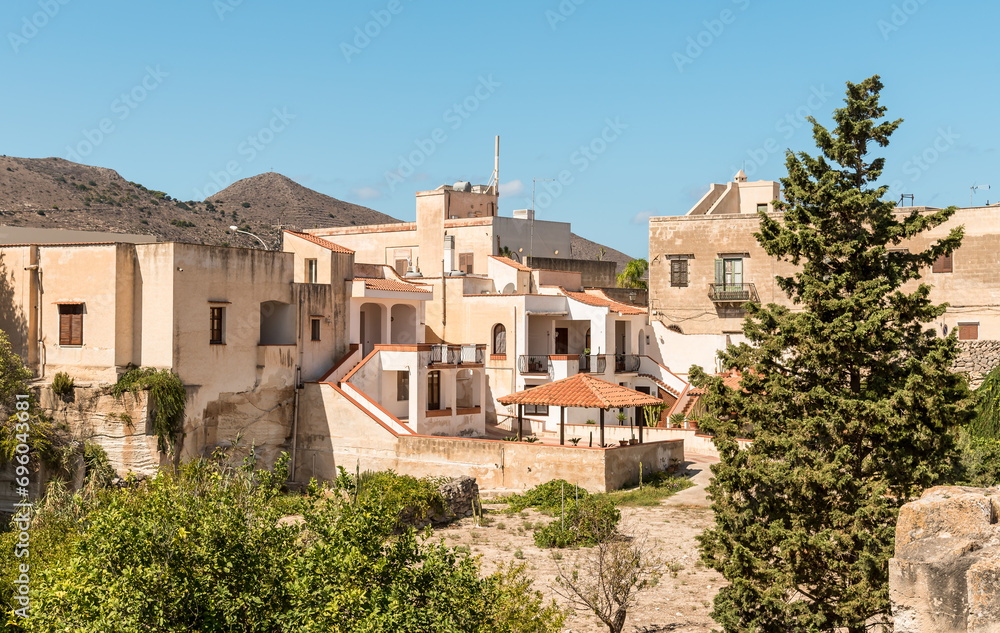 Obraz premium Old stone houses of the residential district on the island Favignana, province of Trapani, Sicily, Italy
