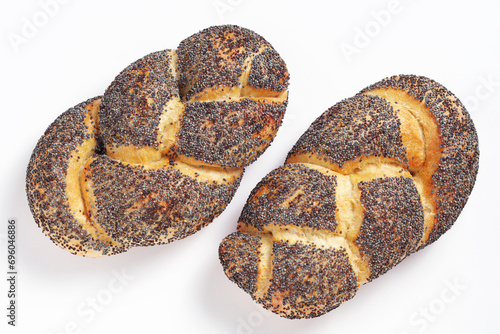 Braided buns with poppy seeds photo