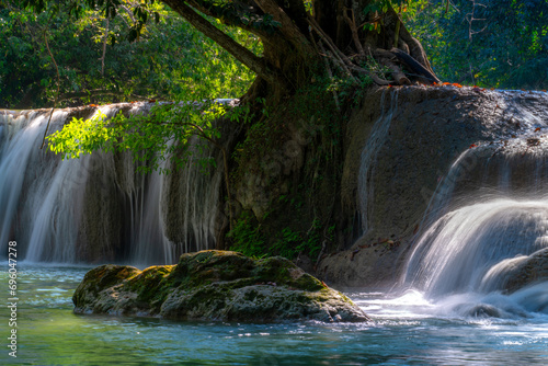 Fototapeta Naklejka Na Ścianę i Meble -  Chet Sao Noi Waterfall, or Seven Little Girls waterfall, a seven tiers of small and beautiful waterfall in Namtok Chet Sao Noi National Park, Saraburi