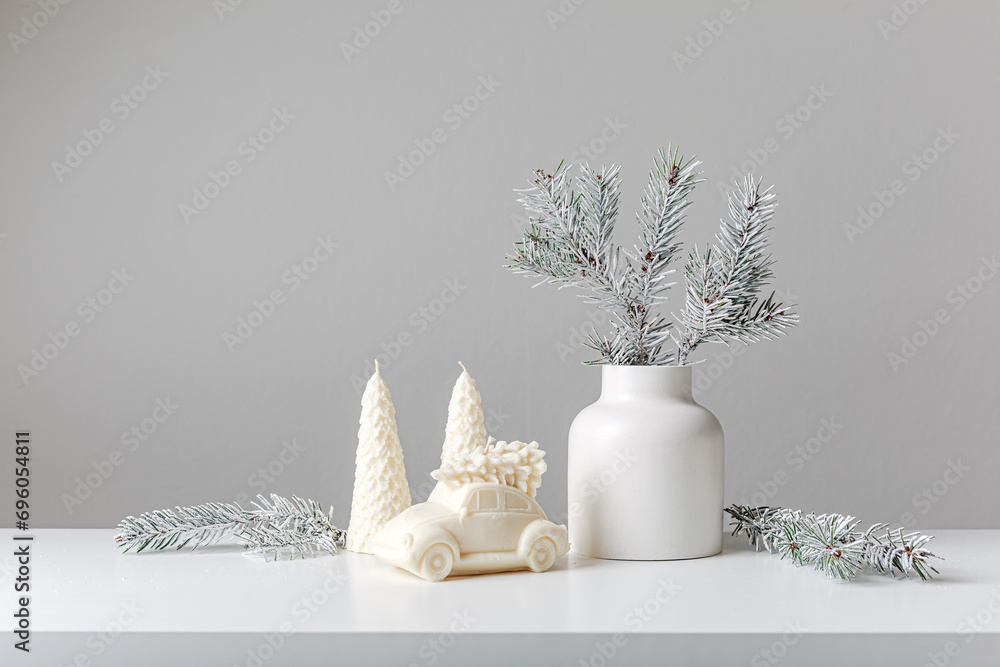 Christmas and New Year composition. Christmas fir tree branches, gifts, pine cones on wooden white rustic background. Flat lay, top view. Copy space. Banner backdrop. Scandinavian houses and candles Christmas and New Year composition. Christmas fir tree branches, gifts, pine cones on wooden white rustic background. Flat lay, top view. Copy space. Banner backdrop. Scandinavian houses and candles