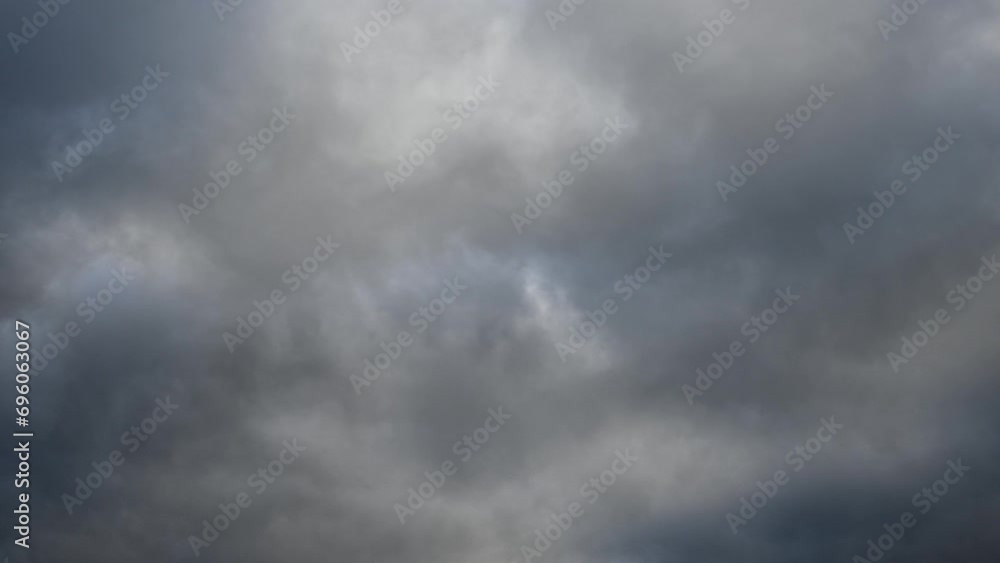 A time lapse looking up at light to dark gray clouds moving from left to right. Only the clouds are included in the time lapse
A time lapse looking up at light to dark gray clouds moving from left to right. Only the clouds are included in the time lapse
