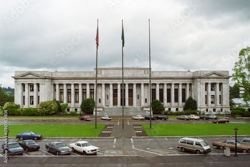Grainy archival film photograph of the Washington State Supreme Court Building with rainy sky.  Shot in May 1992.   photo