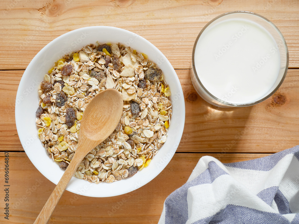 A Bowl of muesli breakfast and rolled oats with dried fruits A Bowl of muesli breakfast and rolled oats with dried fruits