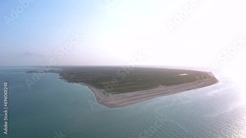Aerial landscape panorama of Skagen Odde peninsula and Grenen - a meeting point of North and Baltic Sea (Skagerrak and Kattegat). North Jutland, Nordjylland, Denmark photo