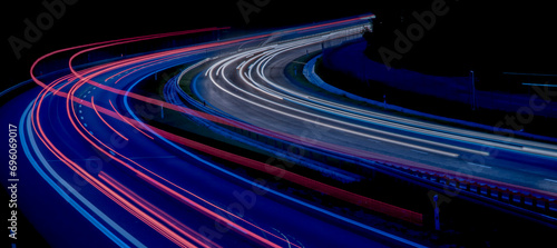 Night road lights. Lights of moving cars at night. long exposure photo
