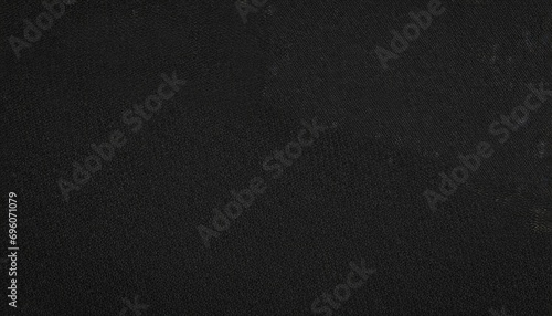 black flag cloth in full frame with selective focus 3d of pitch dark colored garment with clean natural linen texture for background banner or wallpaper use photo