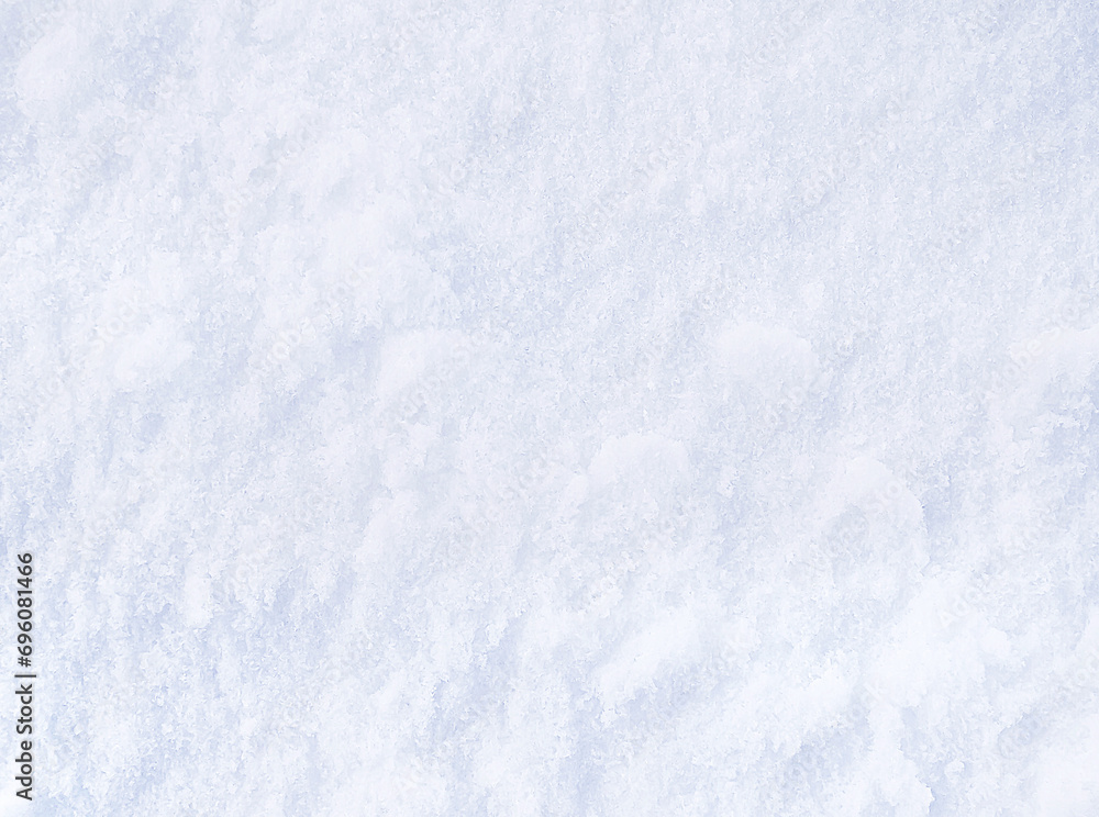 Background of fresh snow. Snowy white texture. Snowflakes.