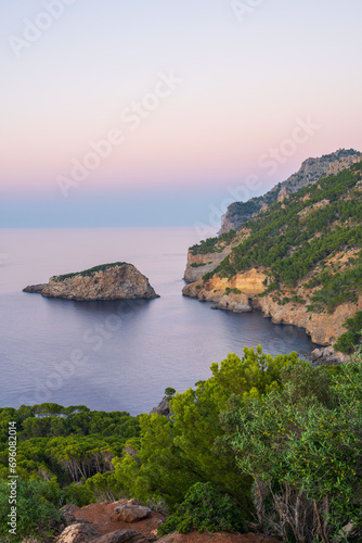 Beautiful view of the coast in Port de Soller at sunset, harbor for yachts and ships on the island of Mallorca, Spain, Mediterranean Sea. Balearic Islands