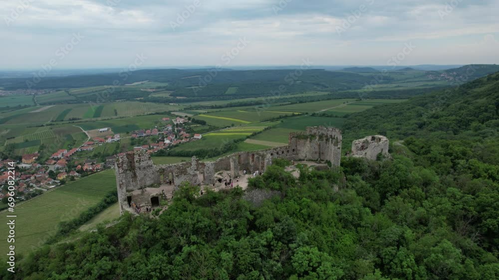 A breathtaking aerial view of the medieval ruins of Devicky Castle, also known as Devin, overlooking the stunning landscape of the Palava region in Moravia