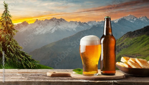 glass of beer and beer bottle photo