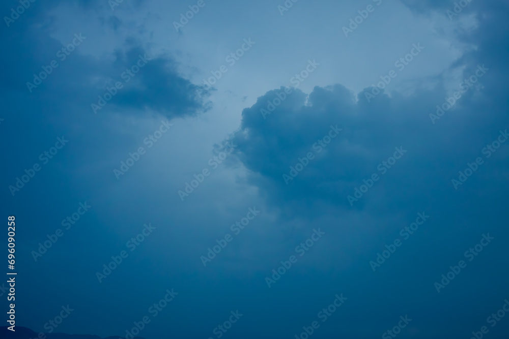 Foggy dramatic sky after the storm with misty clouds and moody mysterious atmosphere Foggy dramatic sky after the storm with misty clouds and moody mysterious atmosphere