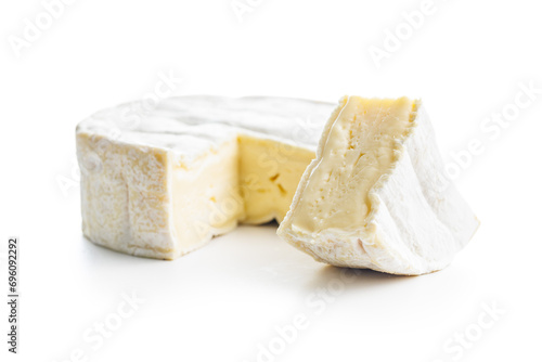 Brie type cheese with white mold. French camembert cheese isolated on white background.