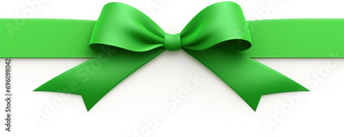 Green ribbon bow isolated on white background
