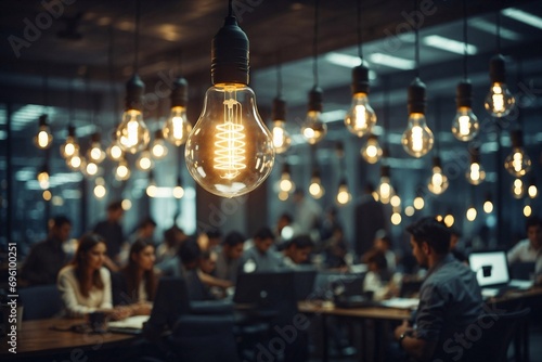 gleaming lightbulbs illuminating team synergy, collaboration, workplace efficiency