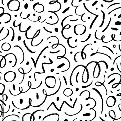 Charcoal pencil scribbles and squiggles seamless pattern. Doodle curved lines and dots like confetti.