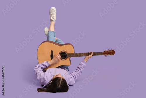 Pretty young woman playing ...