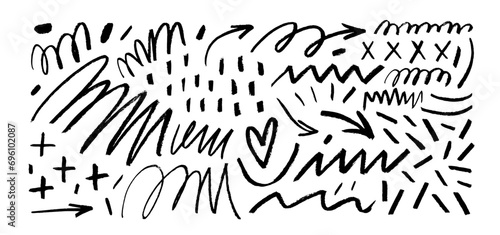 Set of fun monochrome charcoal doodle lines, arrows and strokes.