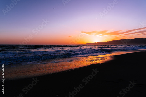 Late evening sunset on the beach © Vladyslav