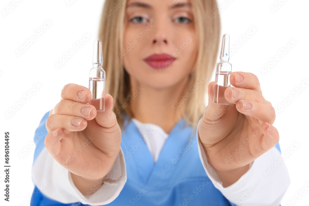 Female nurse with ampules on white background, focus on hands. Vaccination concept Female nurse with ampules on white background, focus on hands. Vaccination concept